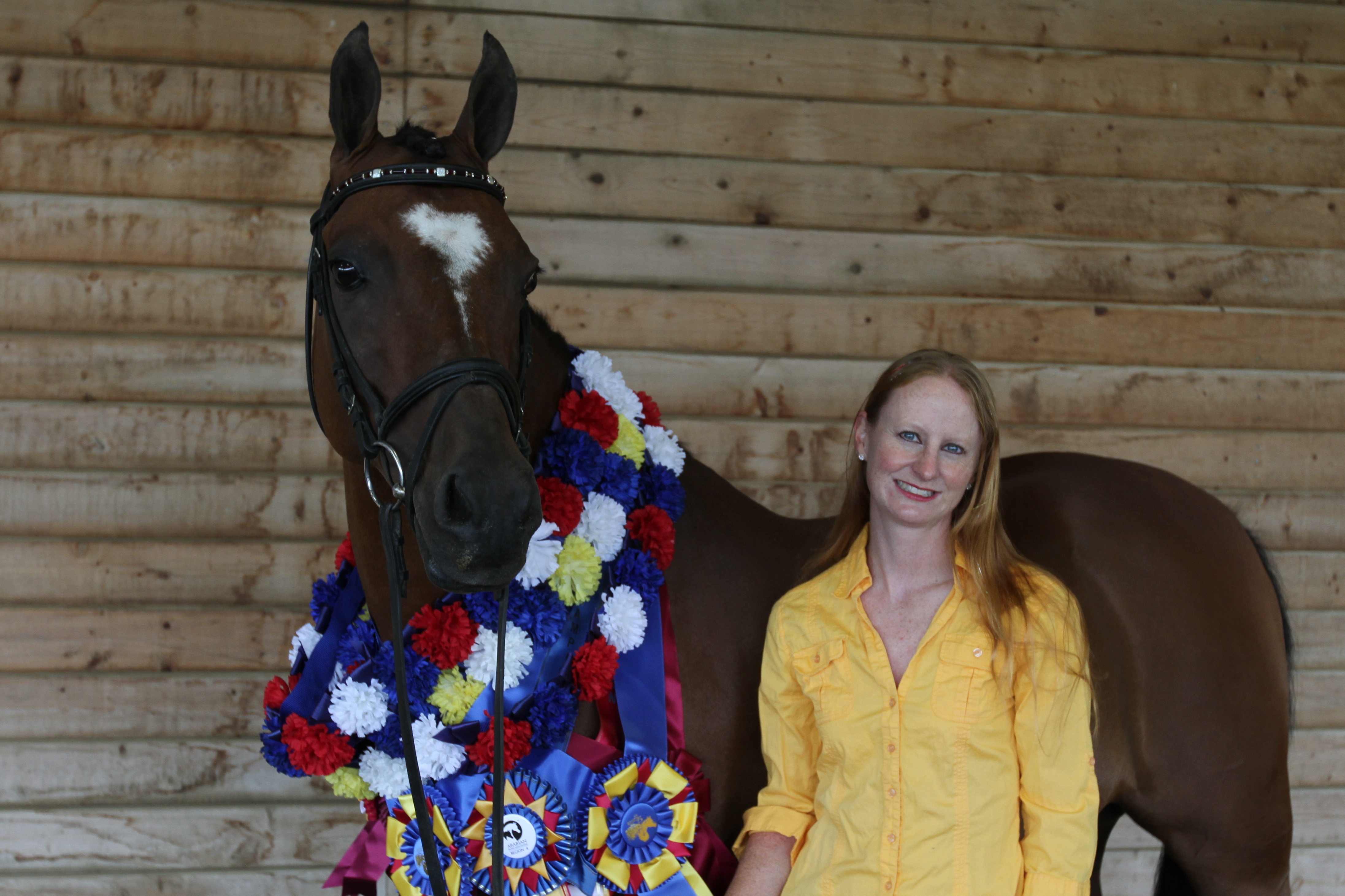 Kim and multi-champion  FEI gelding Sunday with some of their awards.