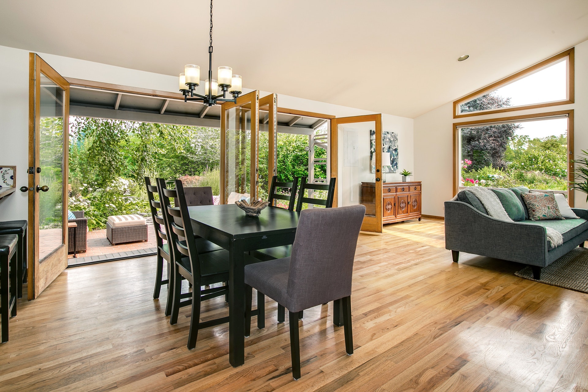 Open concept living / dining/ kitchen with huge double french doors to bring the beautiful outdoors in!